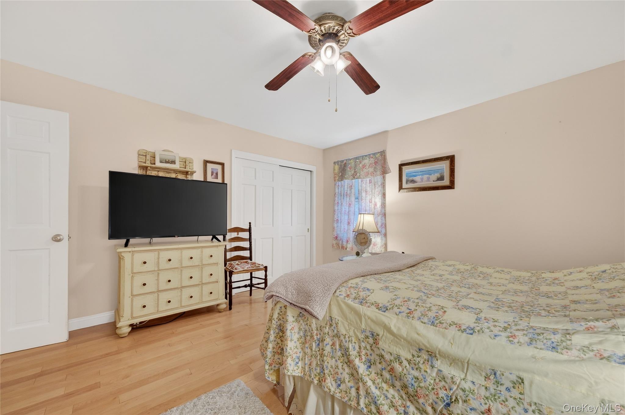 123 Fleury Road Pine Bush, NY 12566 - Photo 27 of 46 Bedroom featuring a closet, light wood-style floors, and a ceiling fan