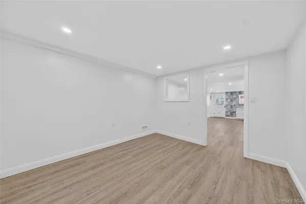 a view of an room with wooden floor