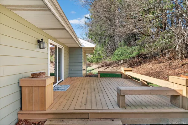 a view of backyard with wooden floor