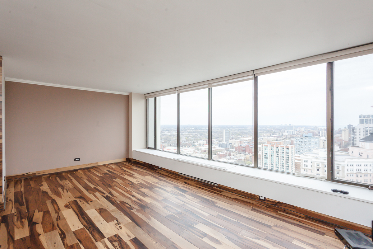 5455 North Sheridan Road, Unit 3307 Chicago, IL 60640 - Photo 11 of 21 a view of an empty room with a window