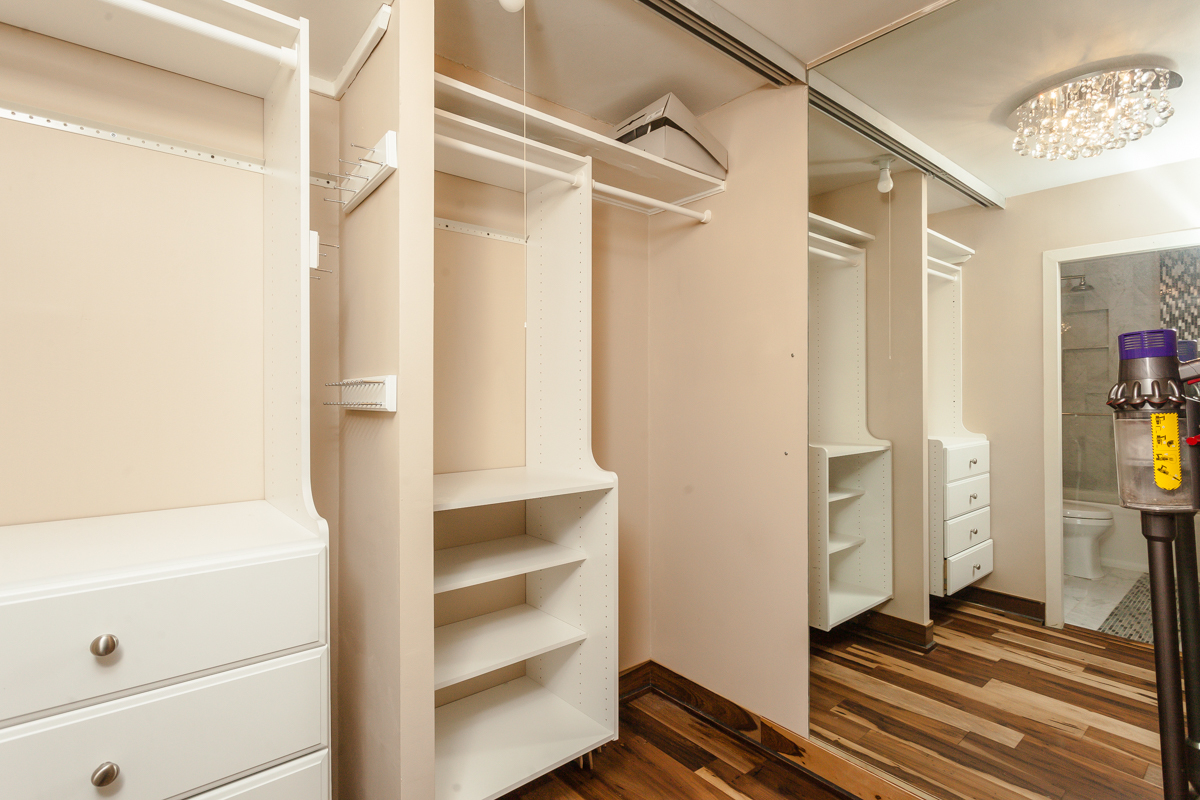 5455 North Sheridan Road, Unit 3307 Chicago, IL 60640 - Photo 17 of 21 a view of walk in closet with empty racks