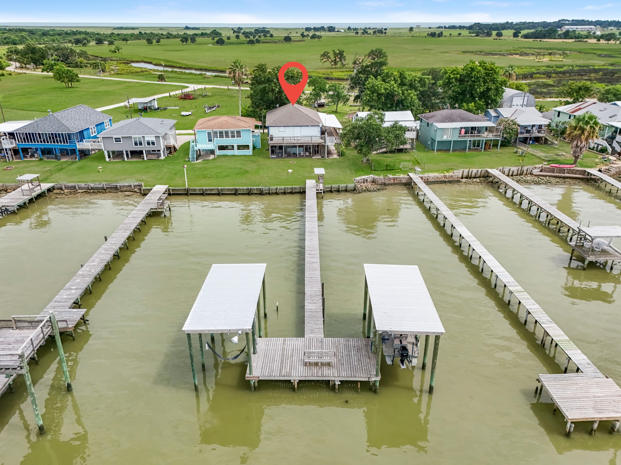 211 Captains Road Anahuac, TX 77514 - Photo 2 of 39 Check out the most fabulous pier and dual boat lift!!!