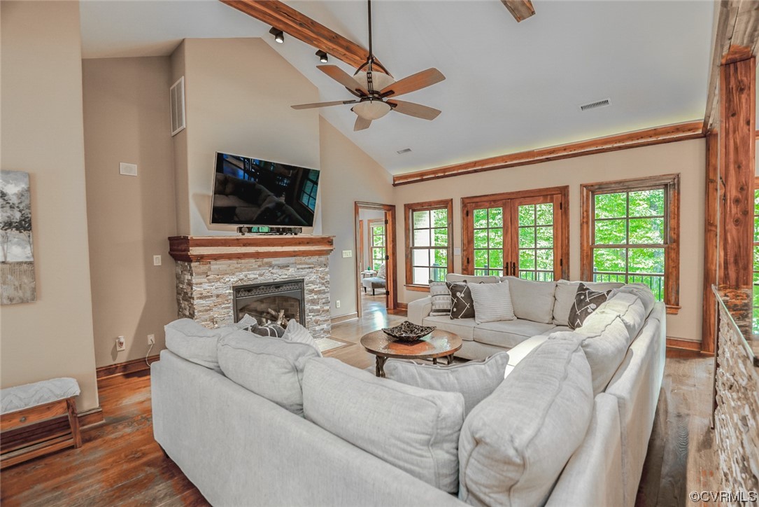 14440 Yankeetown Road Ashland, VA 23005 - Photo 18 of 50 a living room with fireplace furniture and a flat screen tv