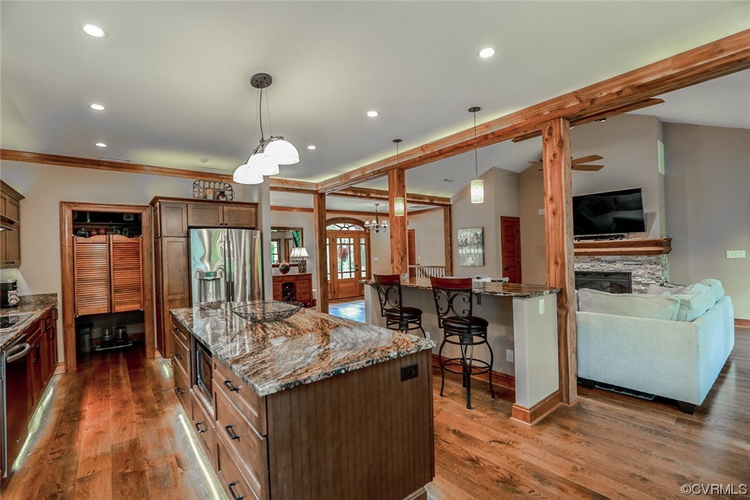 14440 Yankeetown Road Ashland, VA 23005 - Photo 21 of 50 a living room with furniture and a chandelier