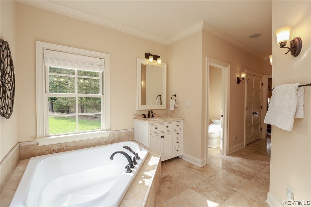 14440 Yankeetown Road Ashland, VA 23005 - Photo 32 of 50 a bathroom with a granite countertop tub sink and mirror