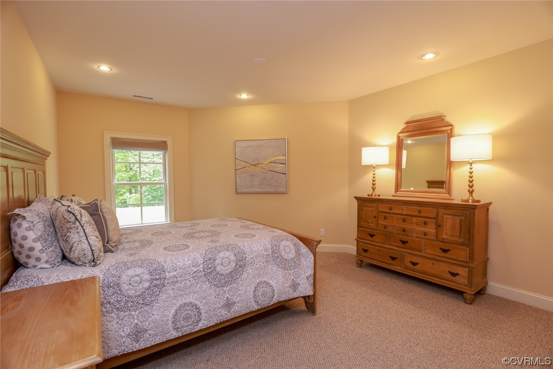 14440 Yankeetown Road Ashland, VA 23005 - Photo 40 of 50 a bedroom with a bed and a dresser