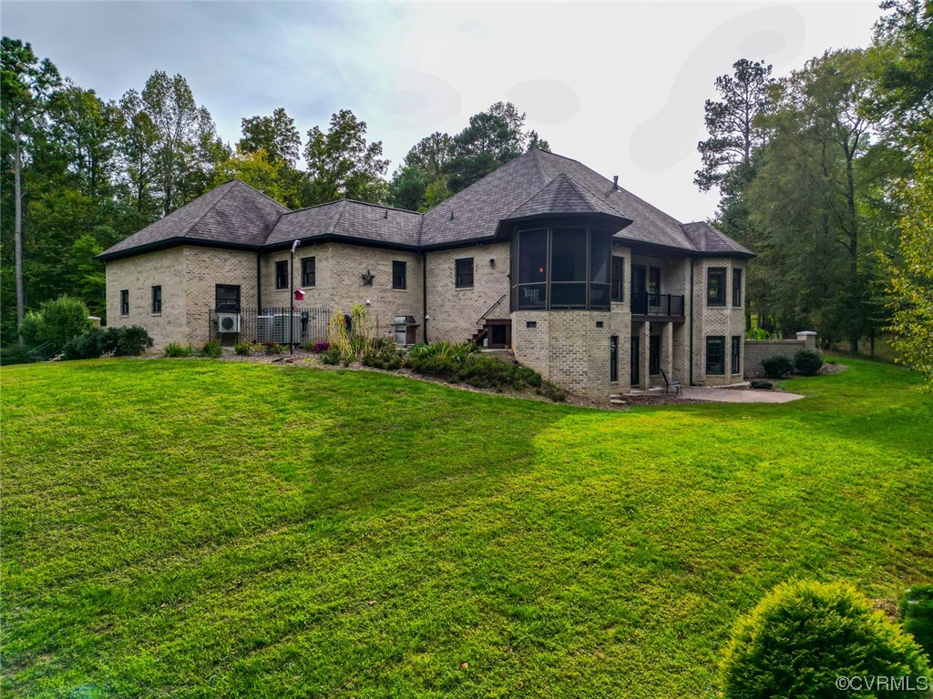 14440 Yankeetown Road Ashland, VA 23005 - Photo 6 of 50 a front view of a house with garden