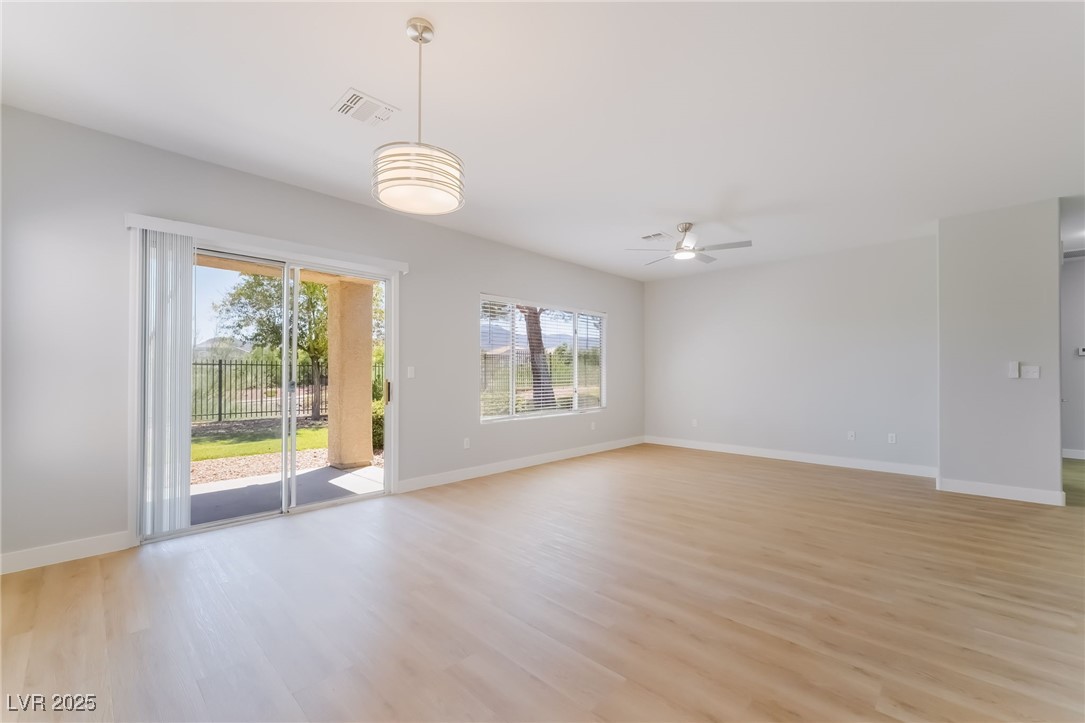 1442 Fieldbrook Street Henderson, NV 89052 - Photo 15 of 36 Spare room featuring light wood-style floors and ceiling fan