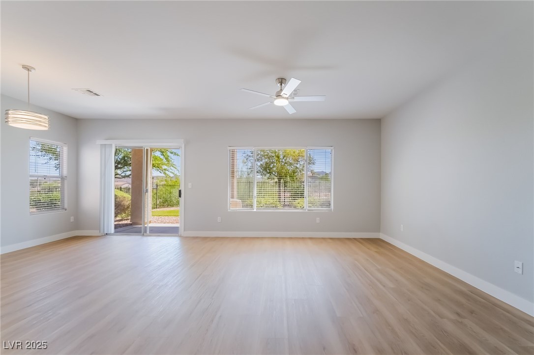1442 Fieldbrook Street Henderson, NV 89052 - Photo 7 of 36 Spare room featuring light wood-style flooring and ceiling fan
