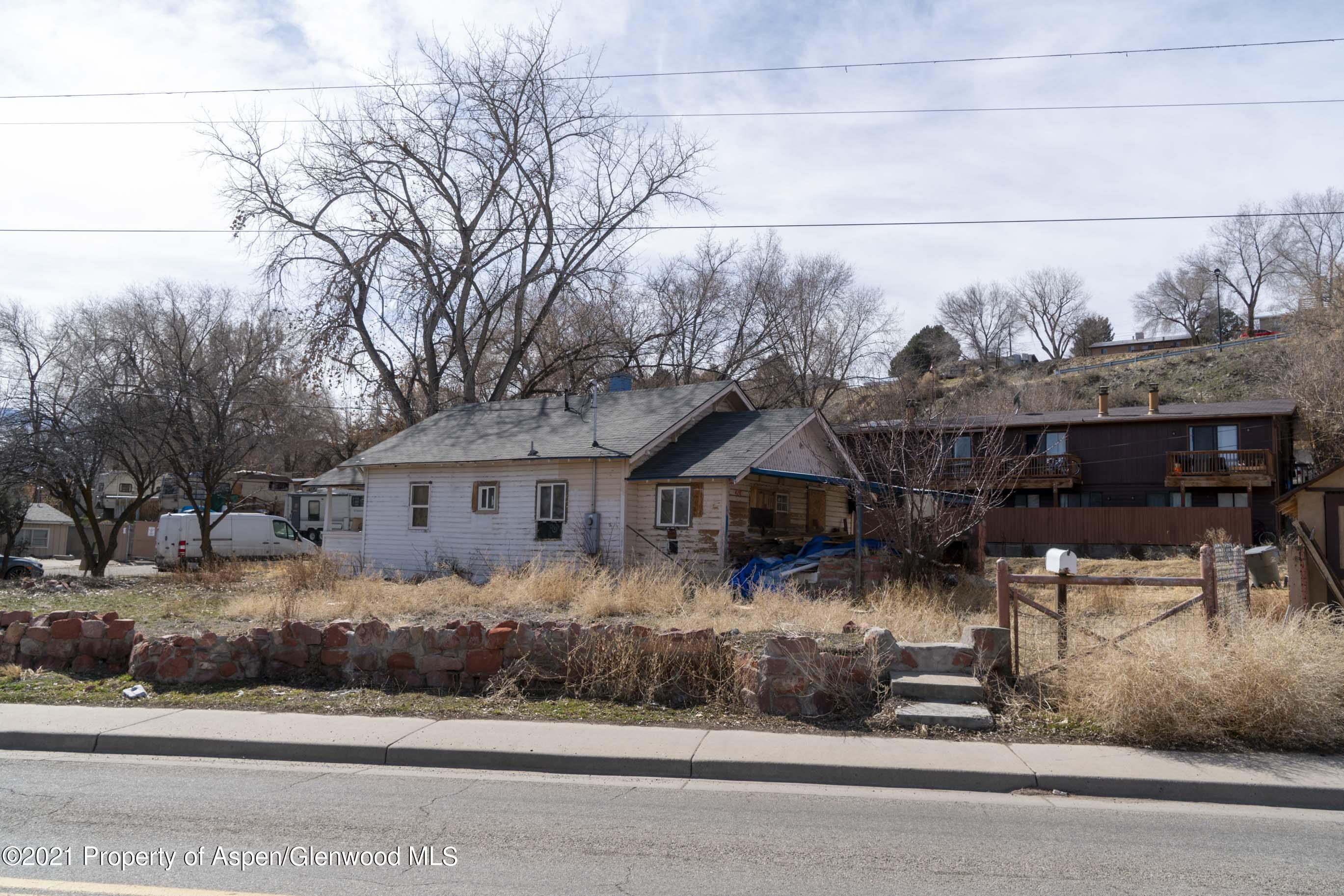 422 West 4th Street Rifle, CO 81650 - Photo 9 of 10 front view of house with a yard