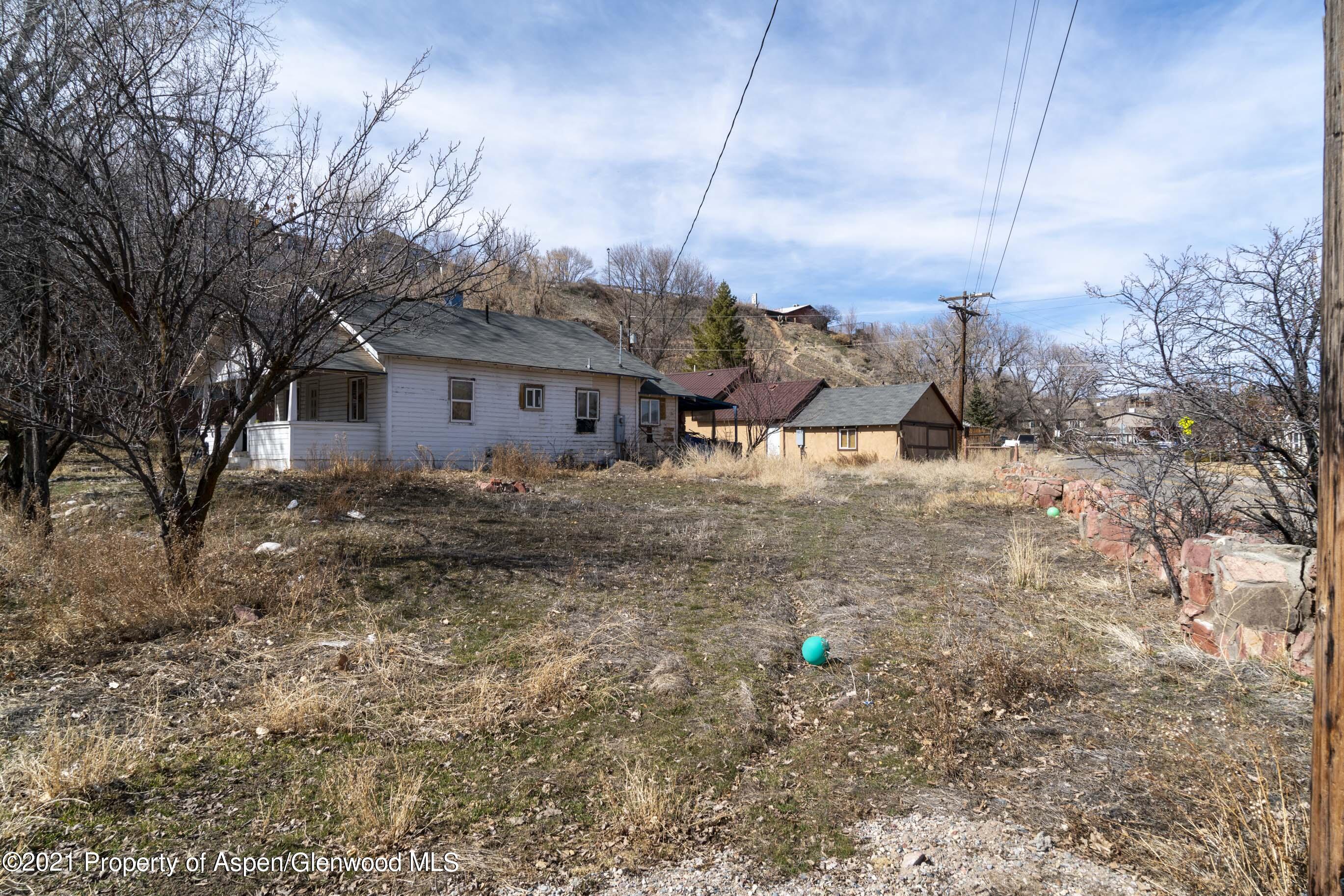 422 West 4th Street Rifle, CO 81650 - Photo 10 of 10 a view of a house with a yard