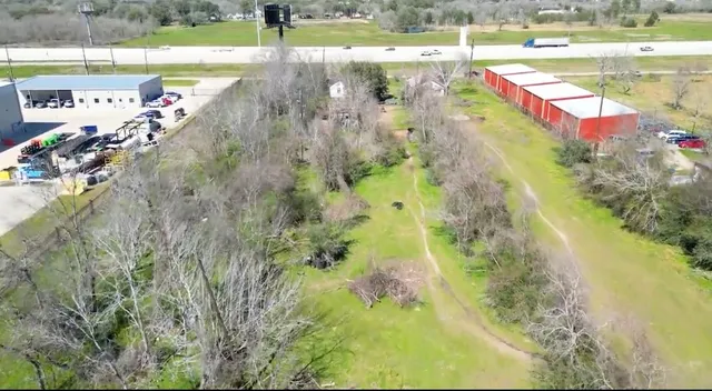 a view of a swimming pool with an outdoor space and seating area