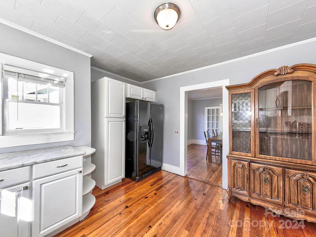 508 South Main Street Troutman, NC 28166 - Photo 12 of 38 a view of a kitchen from the hallway