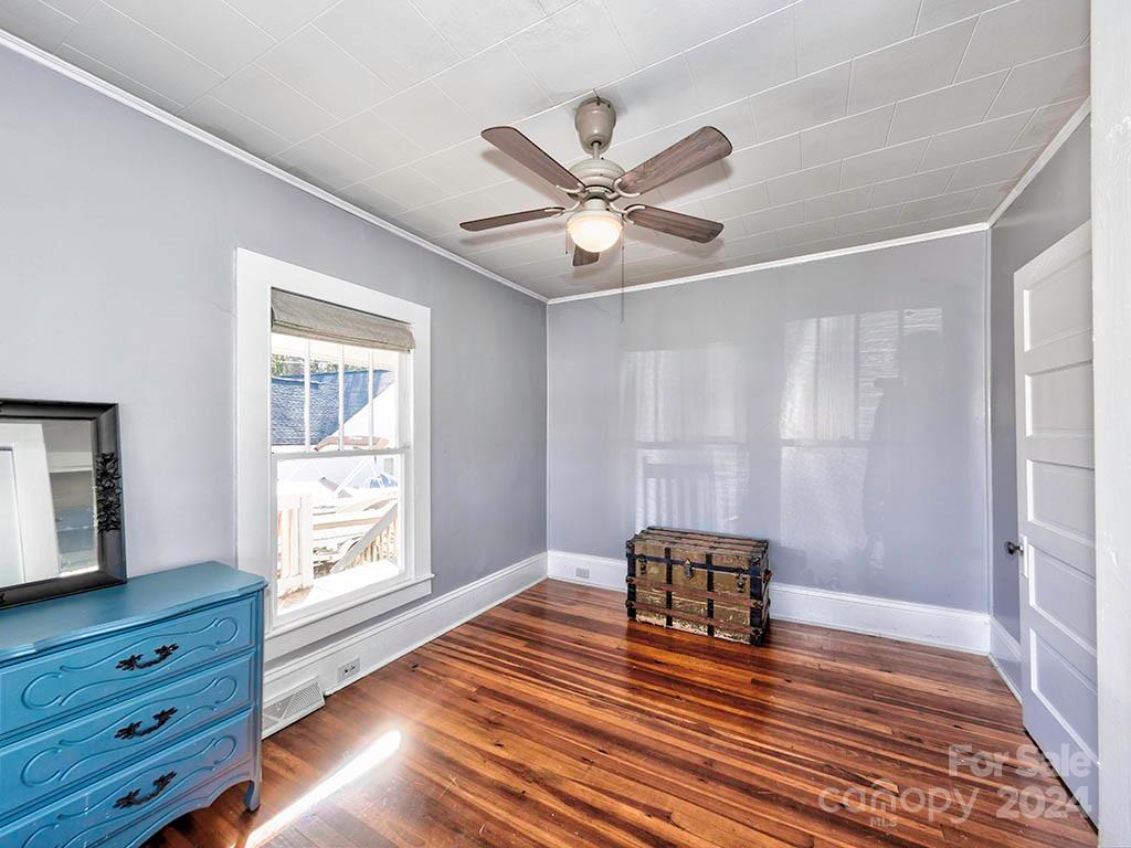 508 South Main Street Troutman, NC 28166 - Photo 16 of 38 a view of room with window and wooden floor