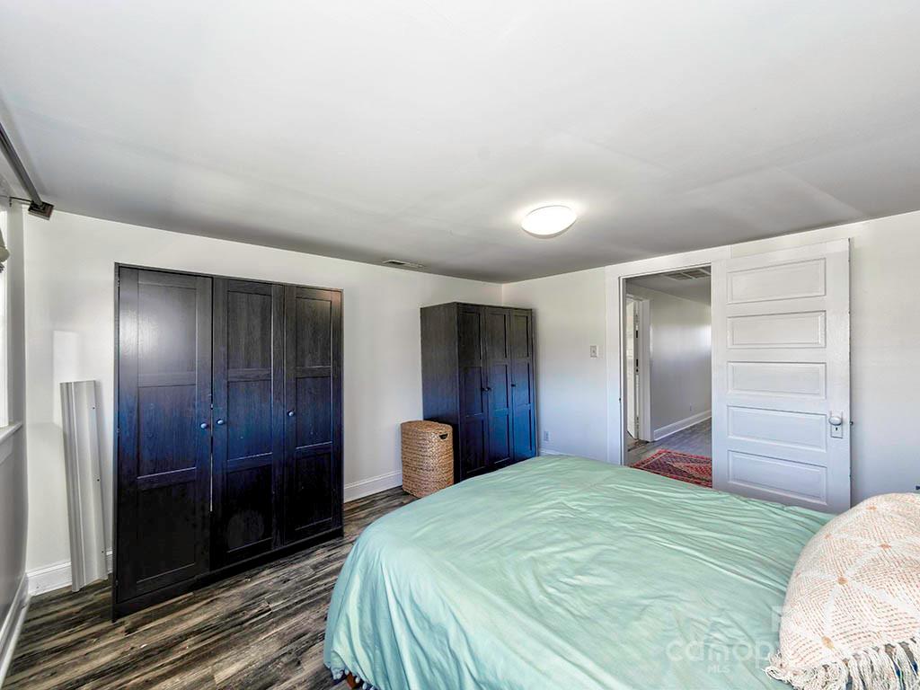 508 South Main Street Troutman, NC 28166 - Photo 24 of 38 a bedroom with a bed and a mirror