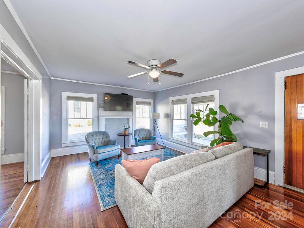 508 South Main Street Troutman, NC 28166 - Photo 5 of 38 a living room with furniture and a large window