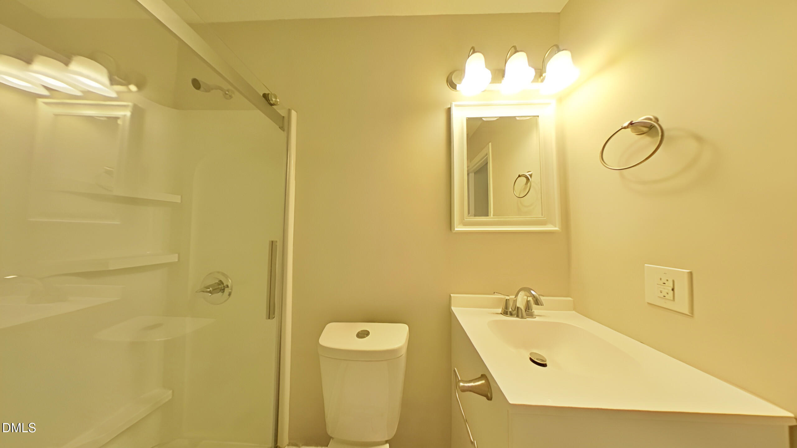 43 Redbud Court Durham, NC 27713 - Photo 12 of 15 a bathroom with a sink mirror and a shower