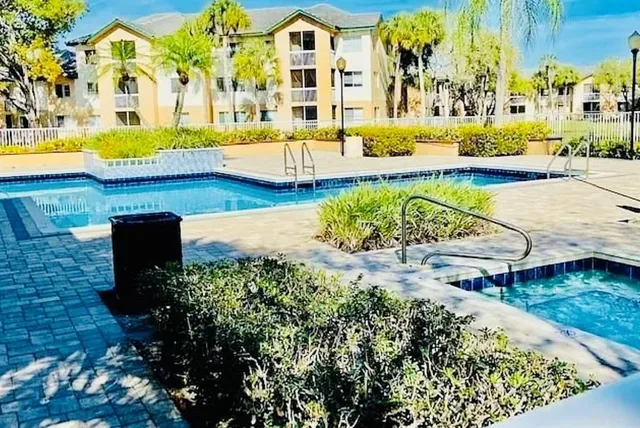 swimming pool with outdoor seating