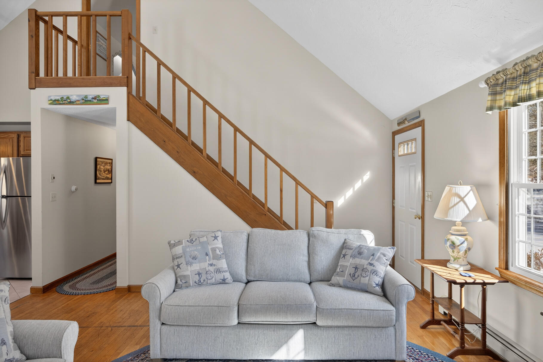 115 Wamsutta Road Eastham, MA 02642 - Photo 13 of 45 a living room with furniture or stairs and a couch