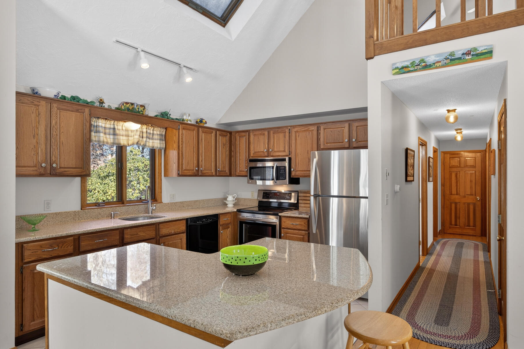 115 Wamsutta Road Eastham, MA 02642 - Photo 15 of 45 a kitchen with a refrigerator a stove top oven a sink and dishwasher