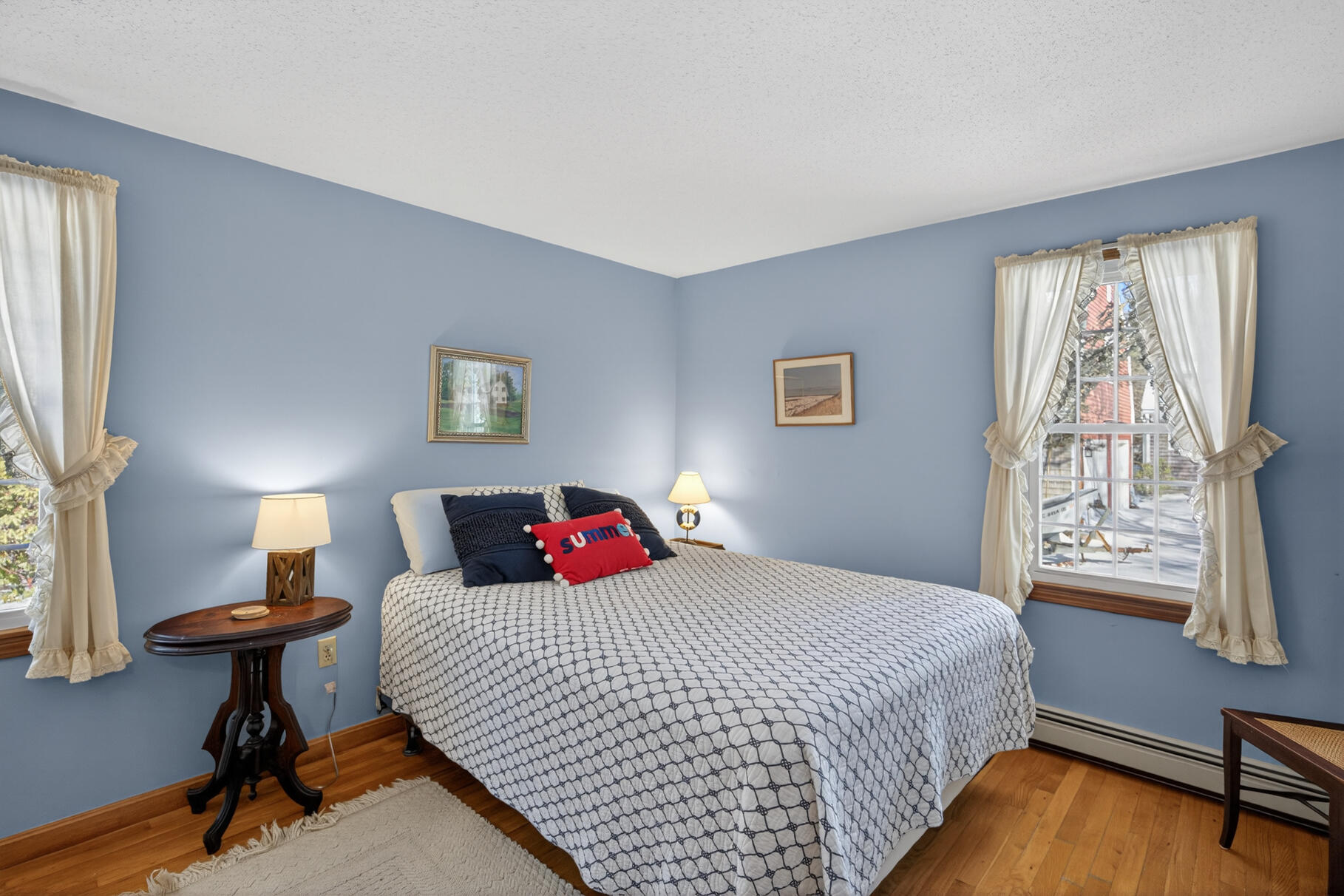 115 Wamsutta Road Eastham, MA 02642 - Photo 20 of 45 a bedroom with a bed and a window