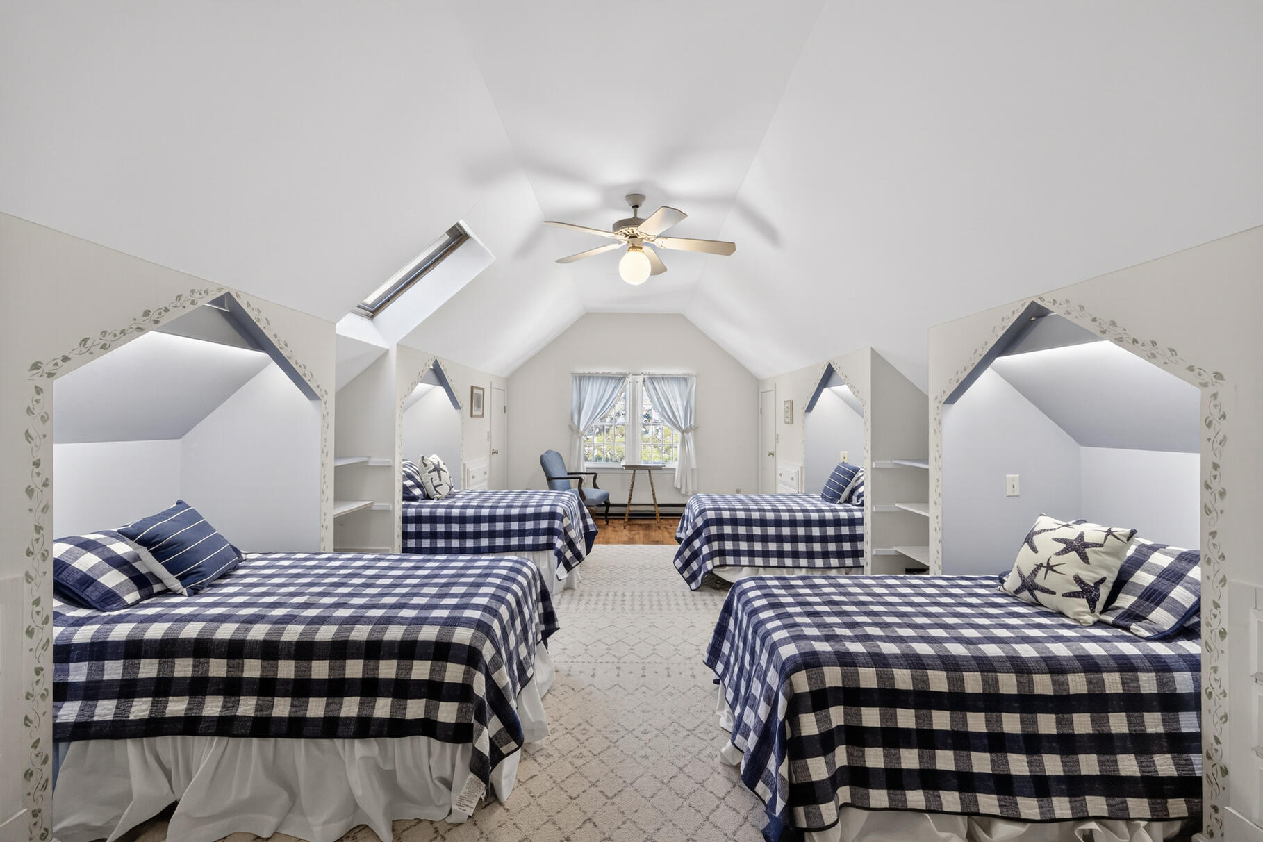 115 Wamsutta Road Eastham, MA 02642 - Photo 25 of 45 a bedroom with double bed and a chandelier