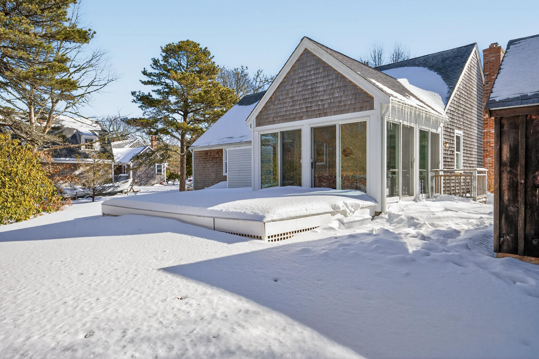 115 Wamsutta Road Eastham, MA 02642 - Photo 34 of 45 front view of a house with a outdoor space