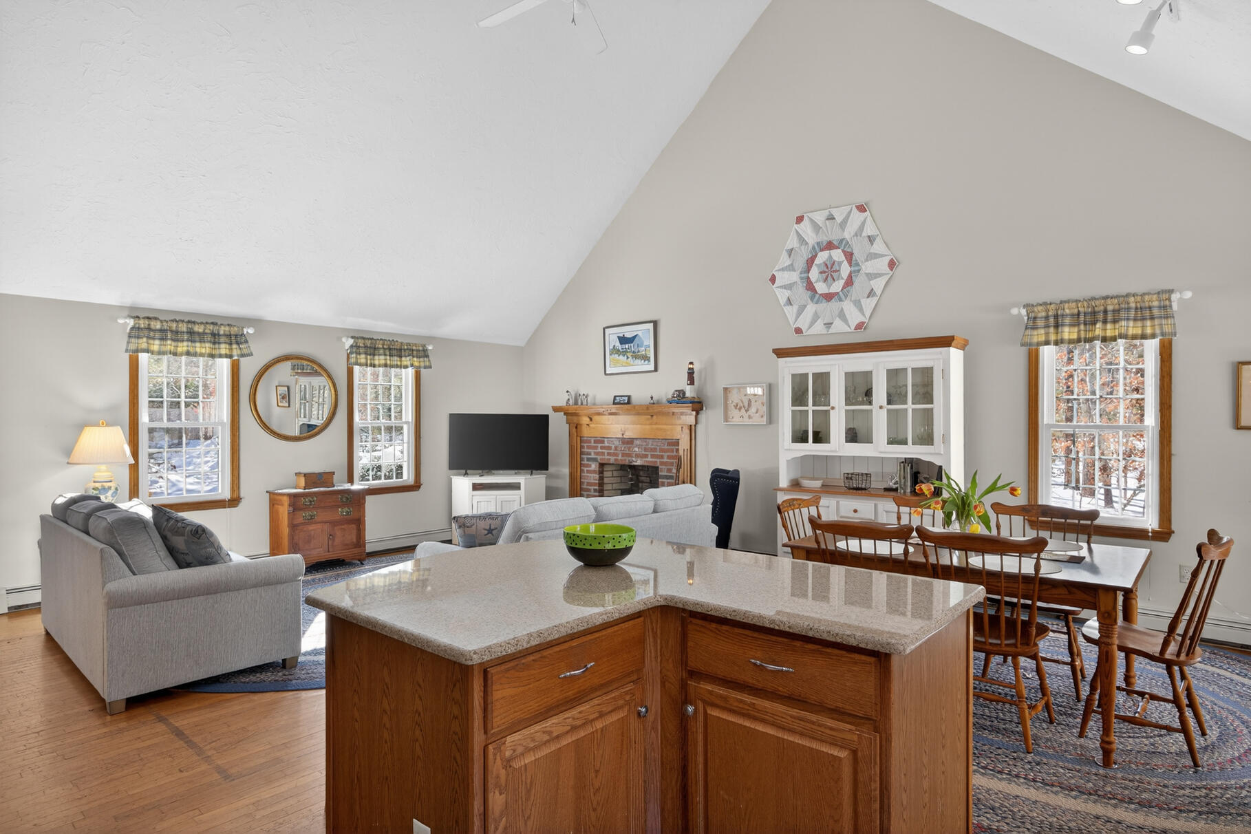 115 Wamsutta Road Eastham, MA 02642 - Photo 6 of 45 a living room with furniture and flat screen tv