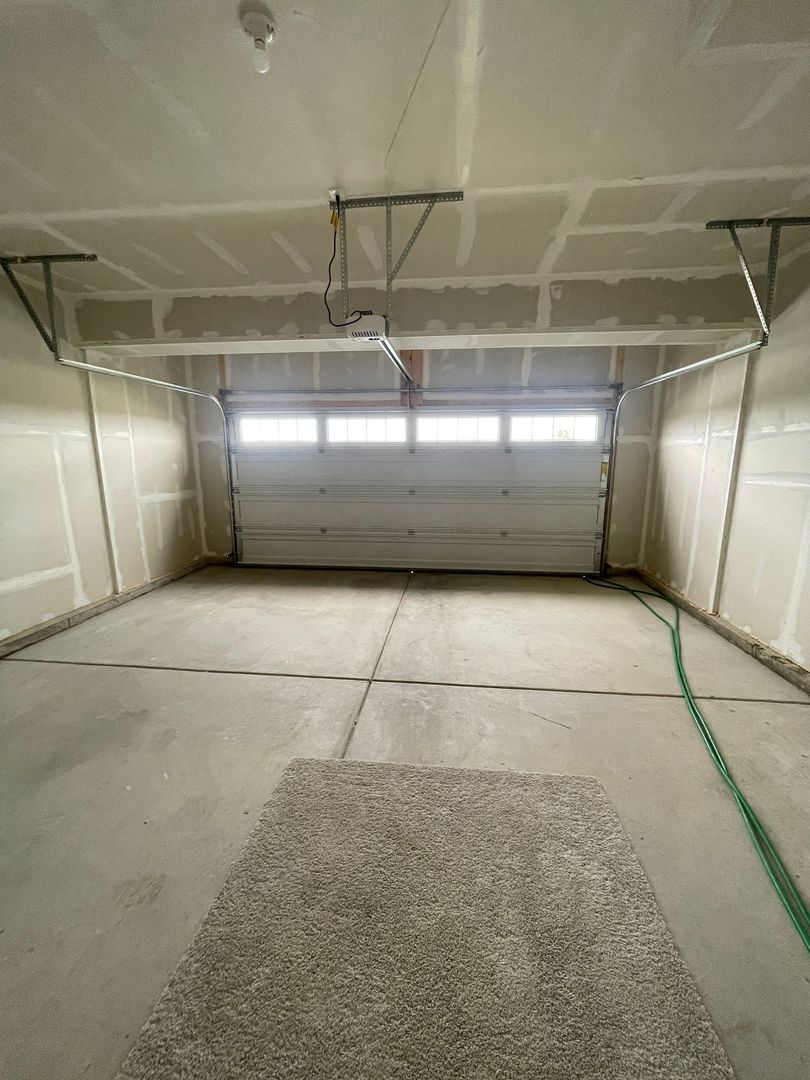 104 Henderson Street Oswego, IL 60543 - Photo 14 of 21 a view of parking garage