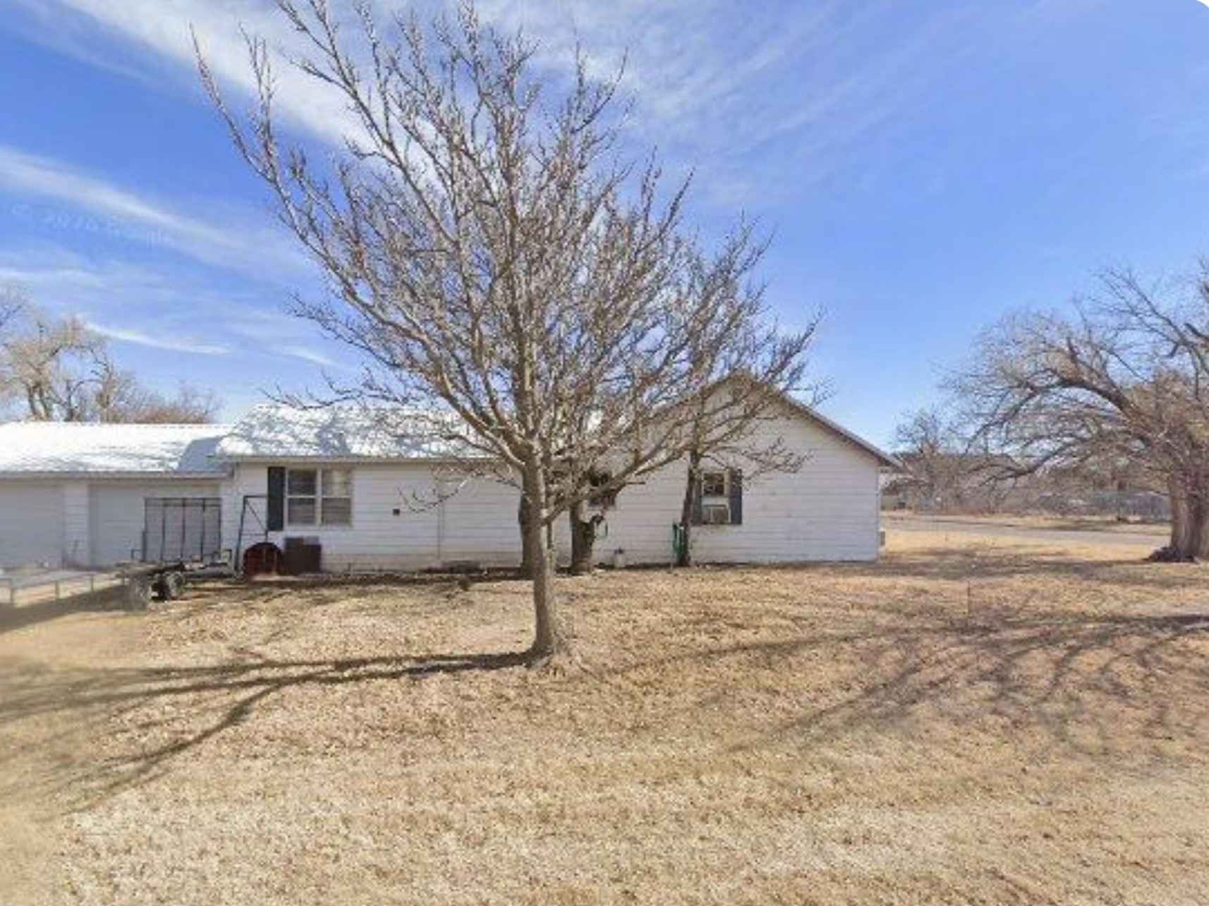419 Fifth Street McLean, TX 79057 - Photo 34 of 34 a view of a yard with a house