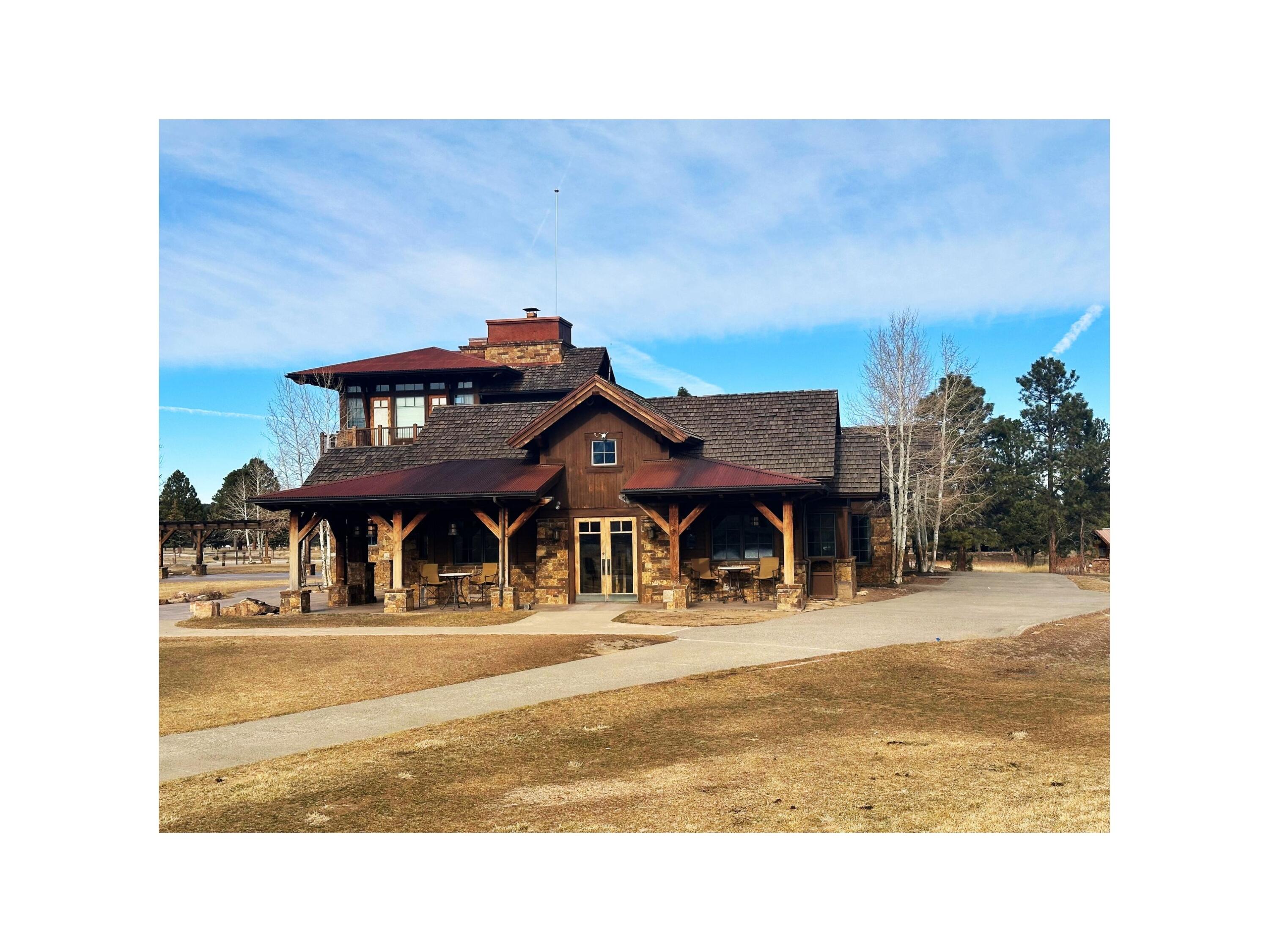 120 Puma Lane Ridgway, CO 81432 - Photo 8 of 10 a picture of a building with a outdoor space