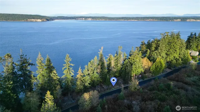 a view of a lake and a mountain in the background