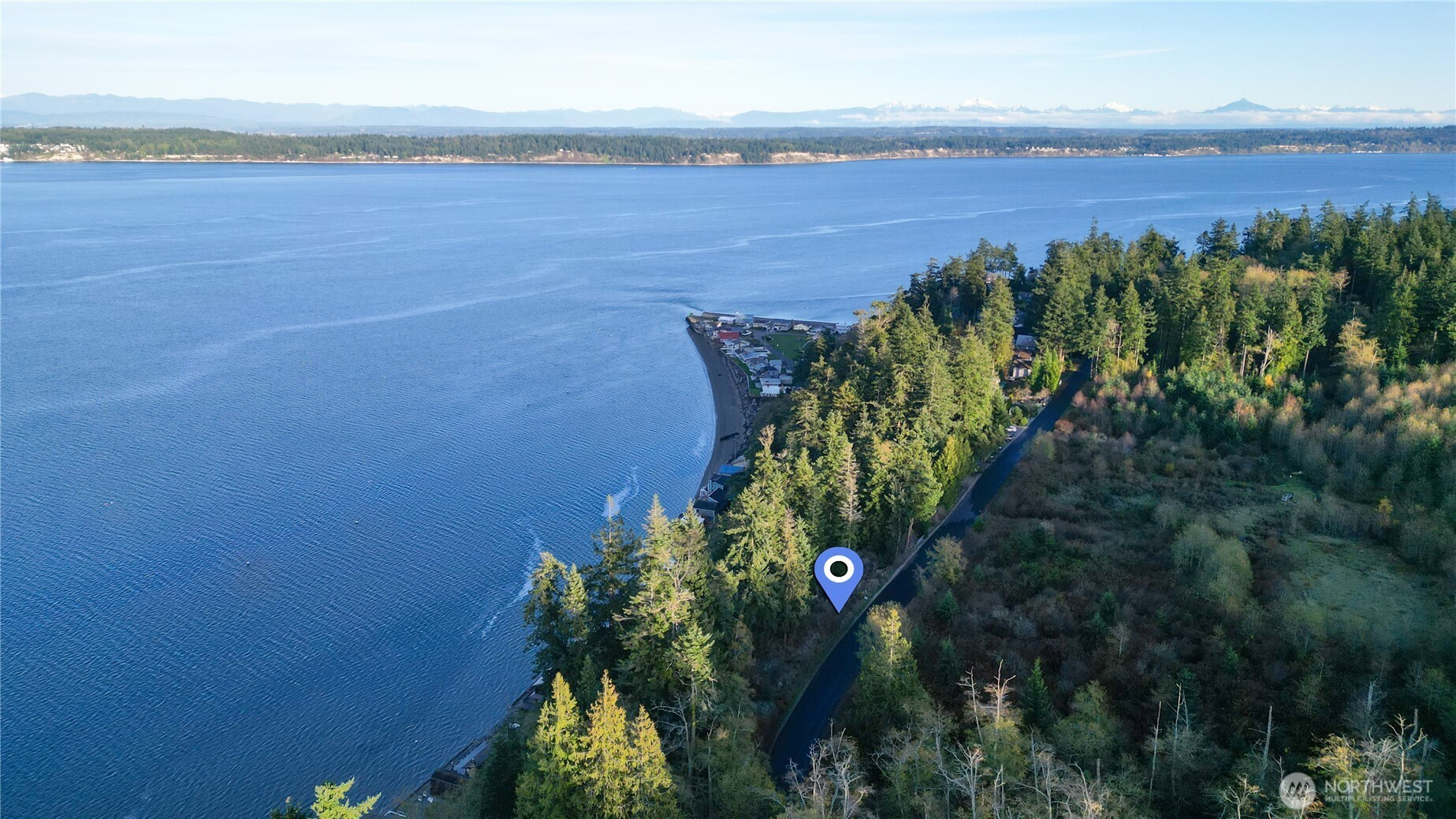 -xxx Fox Spit Road Langley, WA 98260 - Photo 5 of 9 a view of a lake in middle of forest