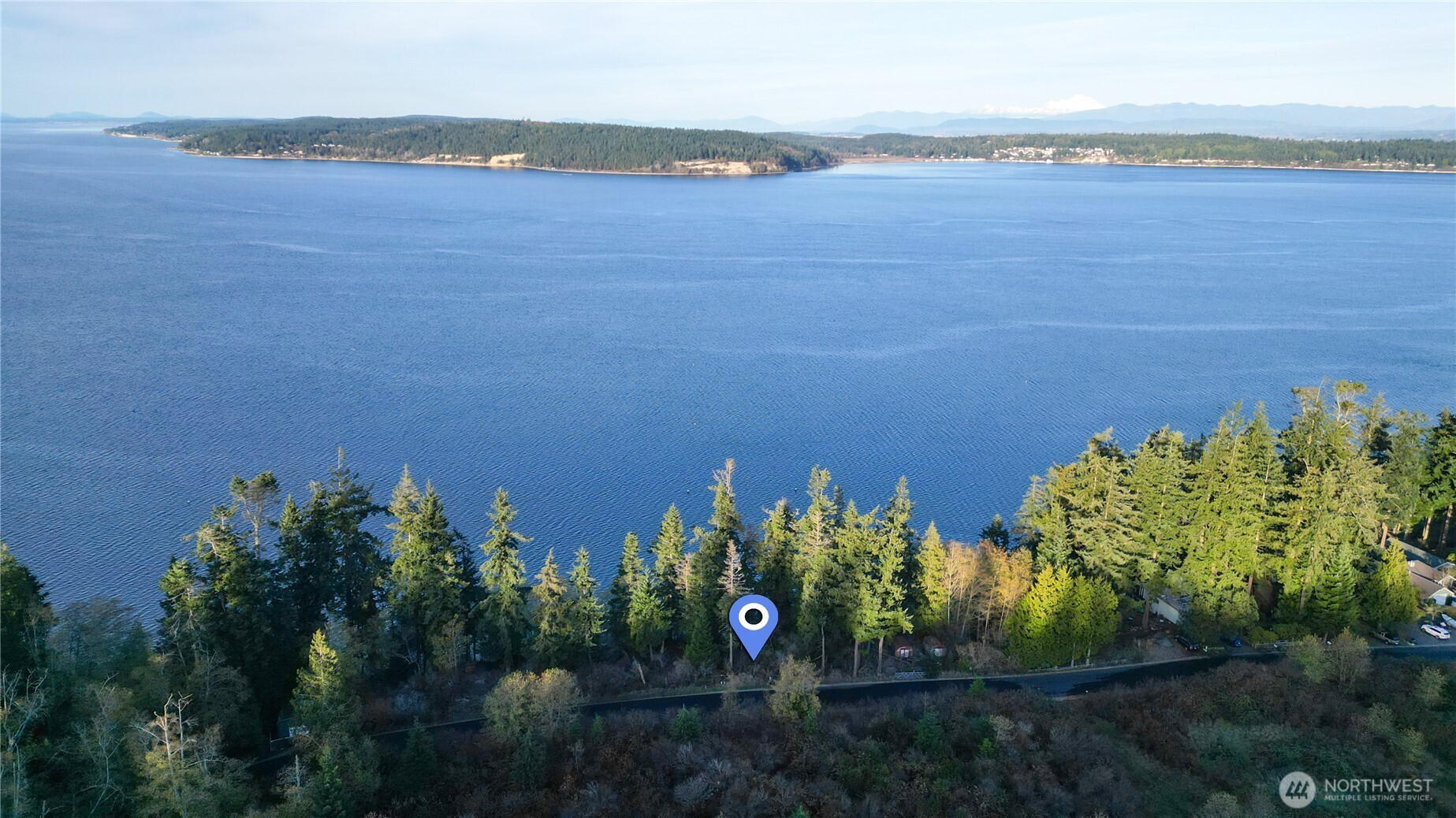 -xxx Fox Spit Road Langley, WA 98260 - Photo 6 of 9 a view of a lake and a mountain in the background