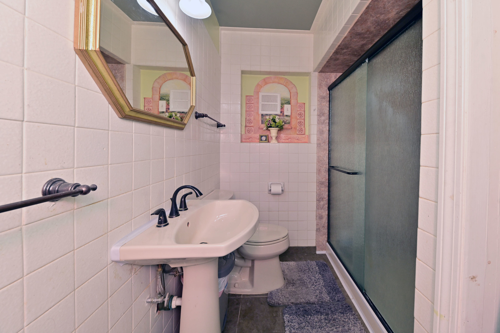 2140 Beechnut Road Northbrook, IL 60062 - Photo 18 of 33 a bathroom with a sink and a mirror