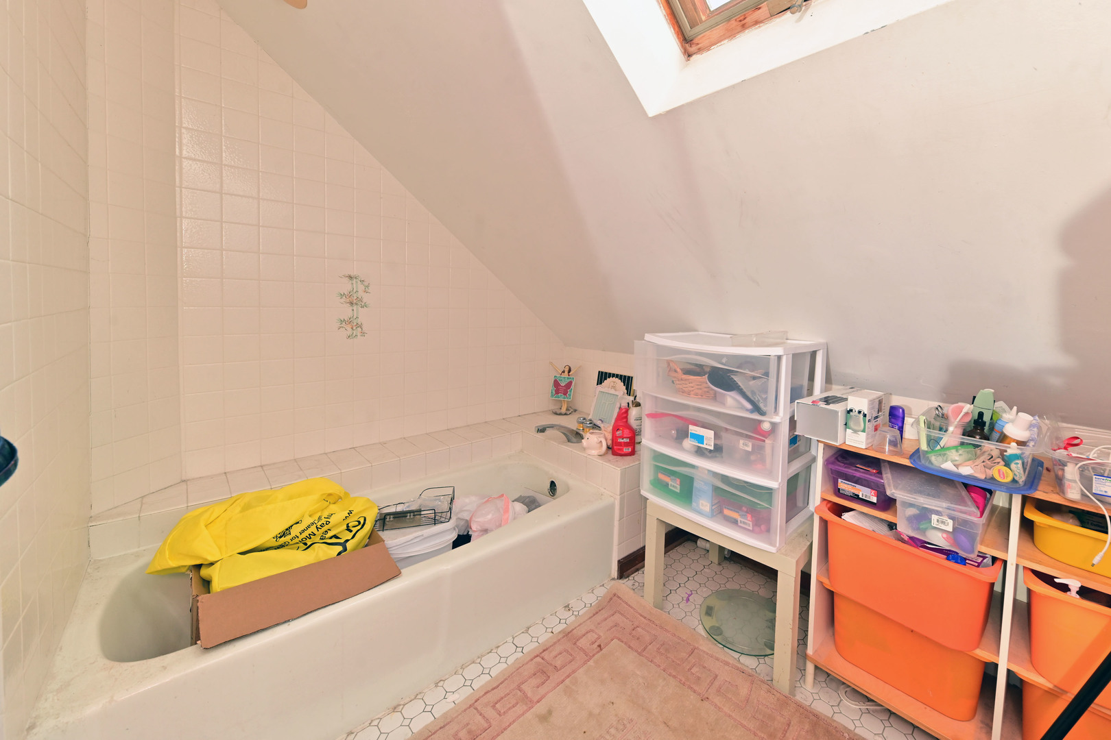 2140 Beechnut Road Northbrook, IL 60062 - Photo 23 of 33 a bathroom with a tub sink and cabinets