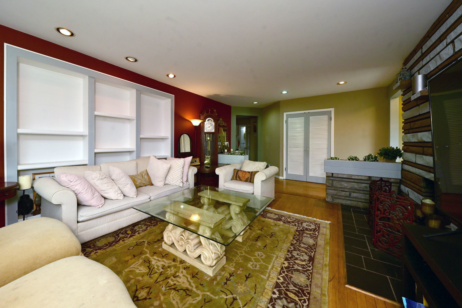2140 Beechnut Road Northbrook, IL 60062 - Photo 7 of 33 a living room with furniture and a flat screen tv