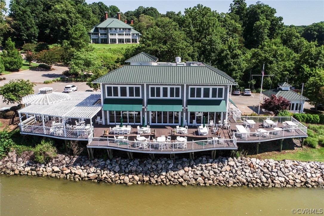 104-8 River Bluffs Williamsburg, VA 23185 - Photo 11 of 14 a front view of a house with a large pool