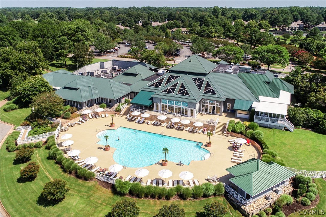 104-8 River Bluffs Williamsburg, VA 23185 - Photo 12 of 14 an aerial view of a house with swimming pool outdoor seating and yard