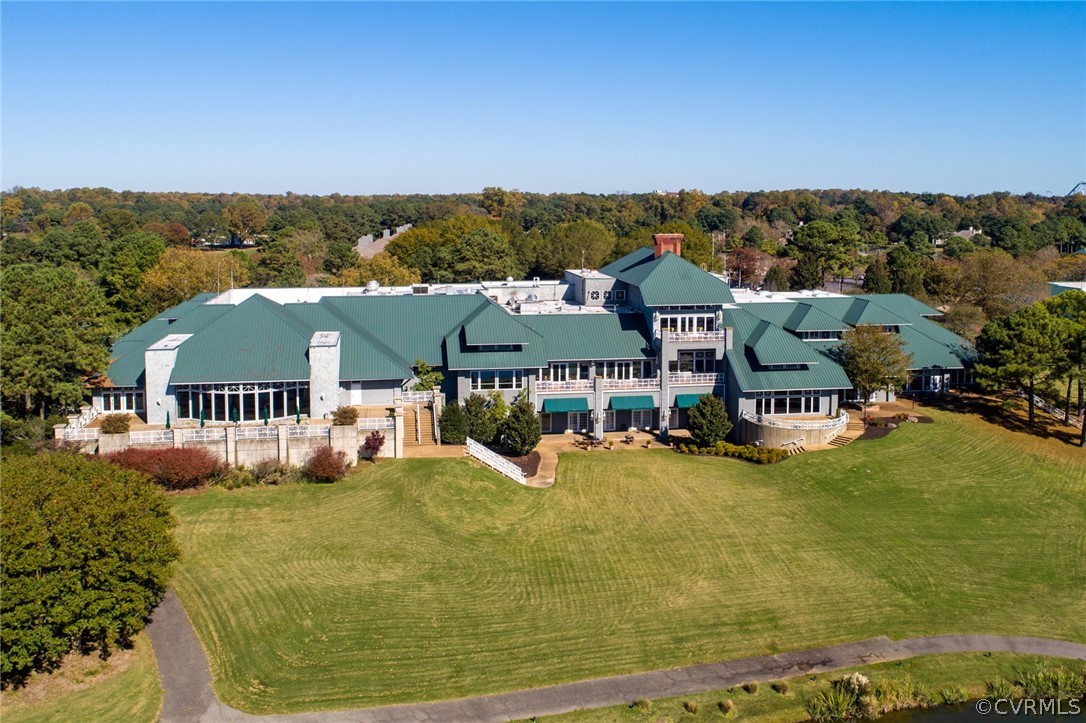 104-8 River Bluffs Williamsburg, VA 23185 - Photo 13 of 14 an aerial view of a house with a garden and lake view