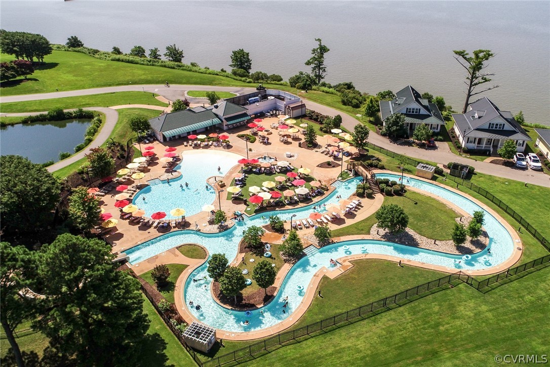 104-8 River Bluffs Williamsburg, VA 23185 - Photo 14 of 14 a view of swimming pool a patio and lake view