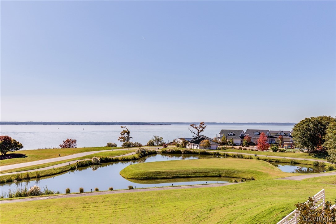 104-8 River Bluffs Williamsburg, VA 23185 - Photo 10 of 14 a view of a swimming pool with outdoor seating