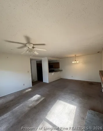 a view of a livingroom with a fireplace