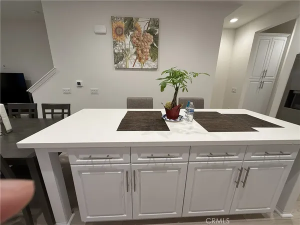 a bed with a bed and a night stand