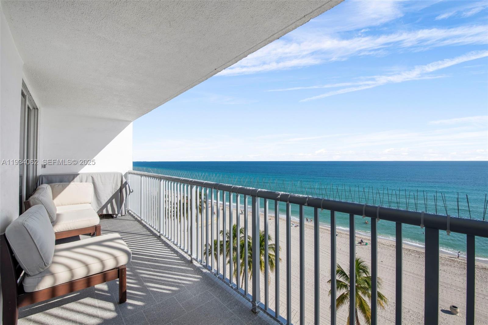 400 North Surf Road, Unit 905 Hollywood, FL 33019 - Photo 3 of 24 a balcony with wooden floor
