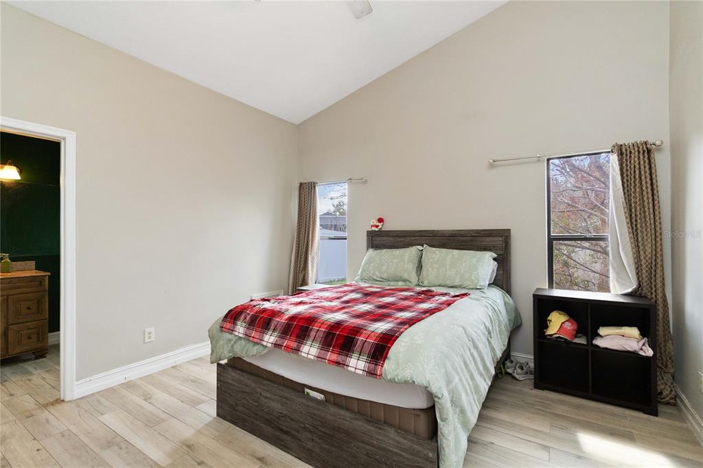 1647 Riveredge Road Oviedo, FL 32766 - Photo 13 of 28 a bedroom with a bed and a window