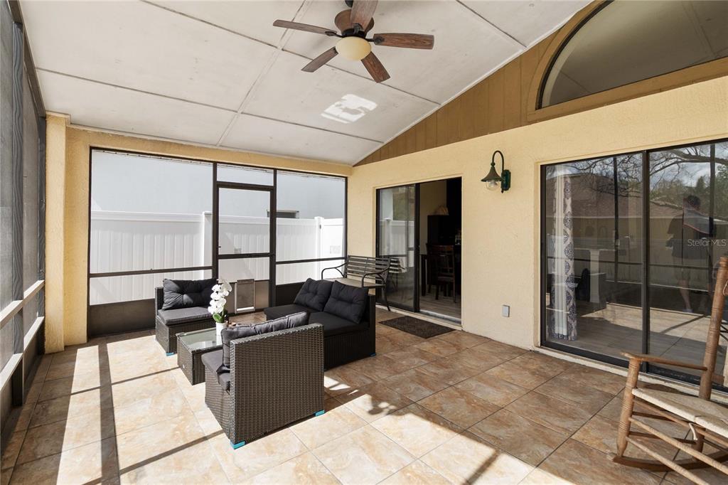 1647 Riveredge Road Oviedo, FL 32766 - Photo 19 of 28 a living room with furniture windows and a table