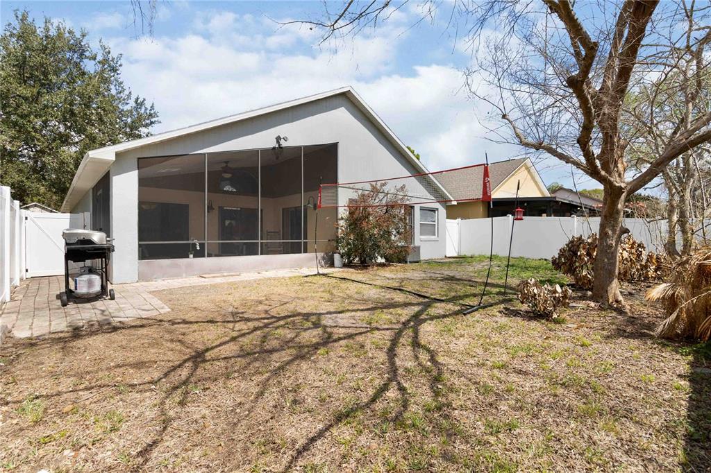 1647 Riveredge Road Oviedo, FL 32766 - Photo 20 of 28 a house with trees in front of it