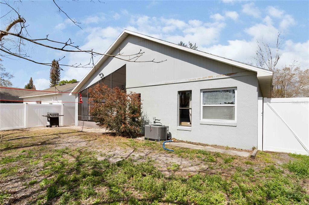 1647 Riveredge Road Oviedo, FL 32766 - Photo 21 of 28 a house with yard in front of it