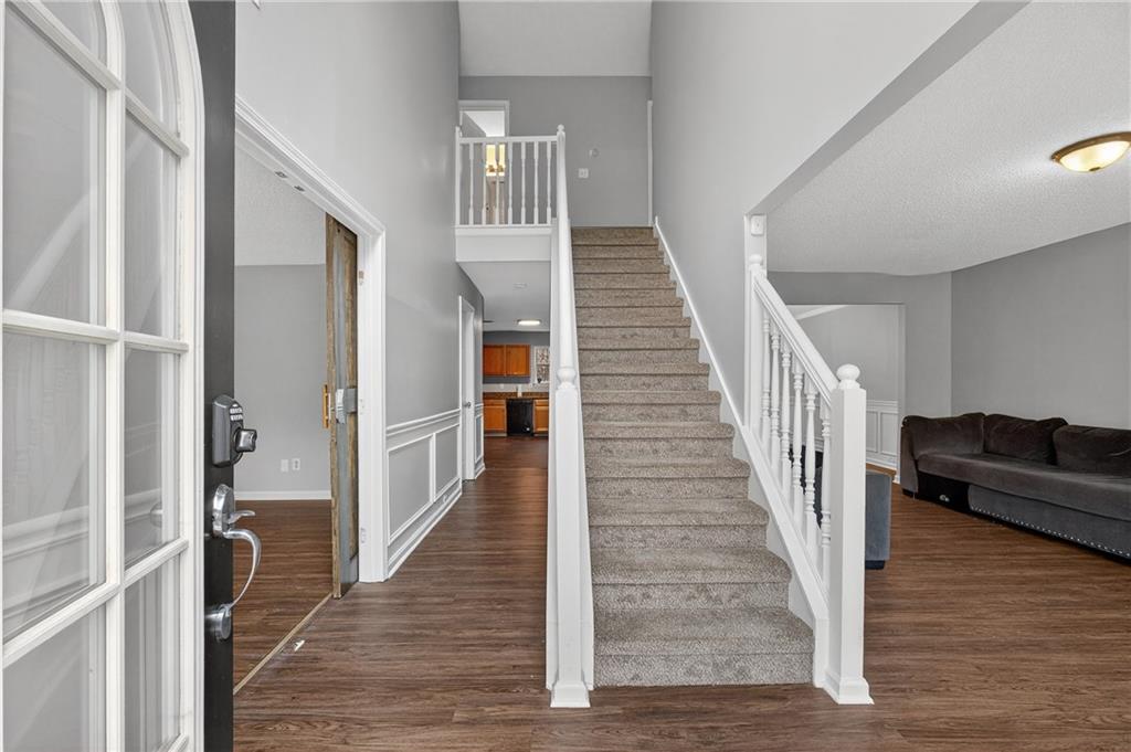 336 Riverview Court Fairburn, GA 30213 - Photo 2 of 18 a view of entryway and hall with wooden floor